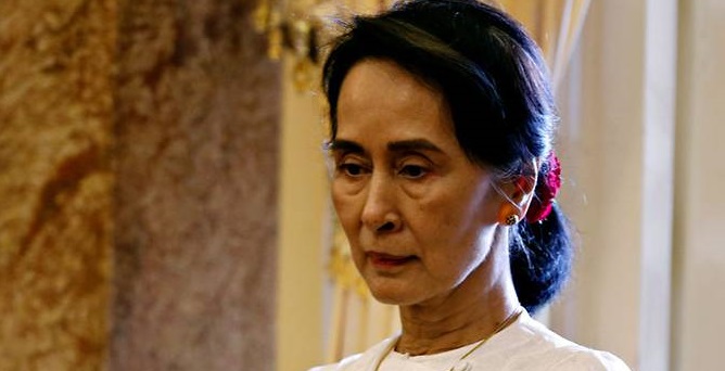myanmar-s-state-counsellor-suu-kyi-is-seen-while-she-waits-for-a-meeting-with-vietnam-s-president-quang-in-hanoi-1.jpg