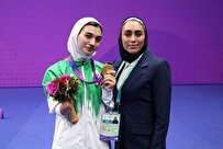 بطلة الباراتايكوندو الإيرانية تهدي ميداليتها الذهبية لنساء وأطفال غزة